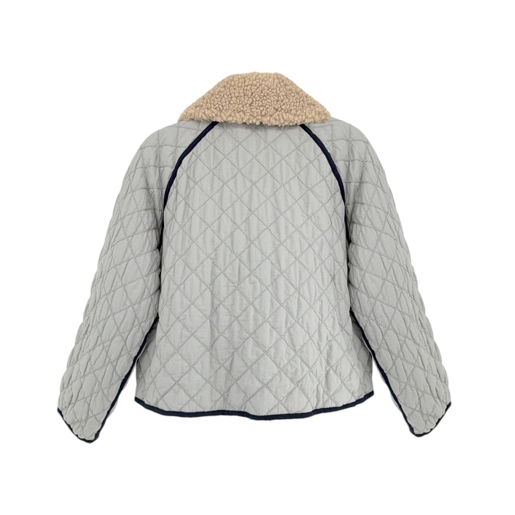 THE GREAT. The Short Quilted Reversible Jacket in Stone Blue 0|XS