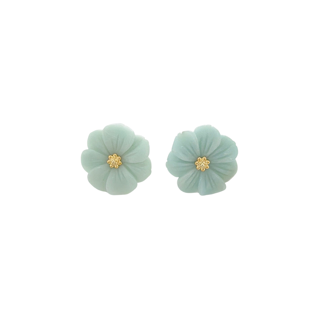 A pair of mint green flower-shaped stud earrings with small gold centers, shown on a plain white background.