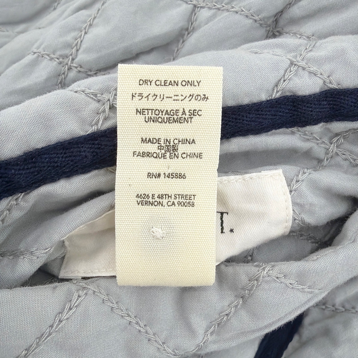 THE GREAT. The Short Quilted Reversible Jacket in Stone Blue 0|XS